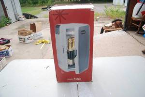 lot 495 image: New in box tiny mini fridge...