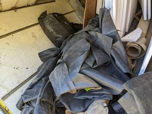 lot 103 image: Massive lot of leftover unused roof...