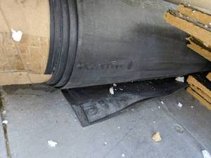 lot 106 image: Leftover unused Roll of roofing rub...