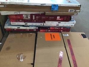 lot 39 image: Lot of assorted Closetmaid shelves and closet units open box see pictures