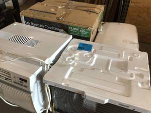 lot 48 image: Pallet with assorted Air conditioners various models and conditions customer returns