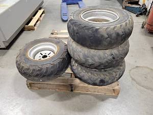 lot 682 image: Set of (4) ATV Rims and Tires - (2) AT25x10-12 and (2) AT25x8-12 - Tires are shot, rims look good - NO SHIPPING