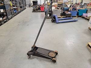 lot 702 image: Walker Floor Jack - Does not Raise - NO SHIPPING