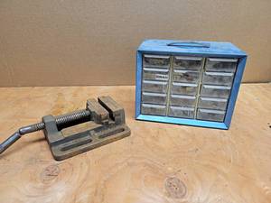 lot 737 image: 4 Drill Press Vise and Parts Cabinet w Contents