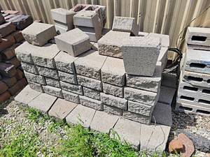 lot 911 image: Large Lot of (95) Retaining Wall Block - Each is about 8 x 8 x 4 - NO SHIPPING