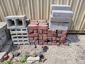 lot 913 image: Large Lot of (75) Vintage Red Brick Pavers - each is about 8 x 4 x 3.5 - Most Say Purington Block  Assorted Cinder Blocks - NO SHIPPING