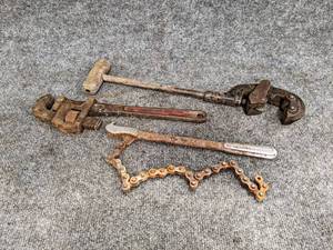 lot 485 image: Western Auto Pipe Wrench, OTC Chain Wrench and Large Pipe Cutter (Needs new Blade)