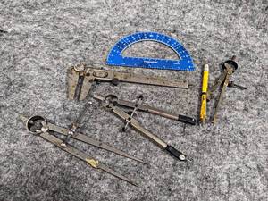 lot 512 image: Lot of Compasses and Protractor