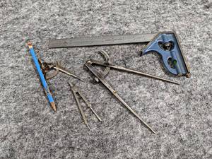 lot 514 image: Divided Caliper Wing Compass  Other Compasses and Square