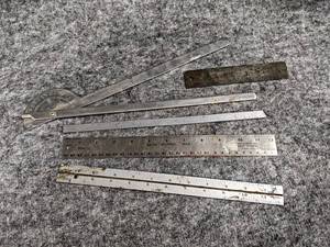 lot 534 image: Orthopedic Equipment Co. Angle Protractor No. 137 and Assorted Metal Rulers