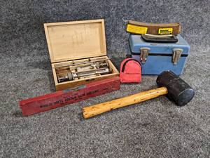 lot 551 image: Durity Syringe Kit, Case, Rubber Mallet, Vintage Level (Leland IA) and More