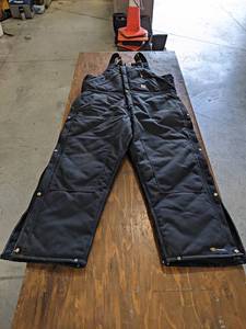 lot 559 image: Pair of Black Carhartt Extremes Cold Weather Bibs - Size 44x32 - Very Good Condition - Barley Worn