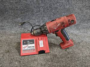 lot 575 image: Milwaukee Heavy Duty Drill w Charger - NO BATTERY