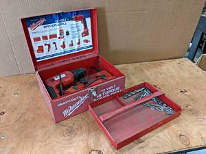lot 808 image: Milwaukee 12V Drill w Batteries, Charger and Metal Case