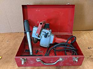 lot 824 image: Milwaukee Heavy-Duty Hole Hawg in Metal Case