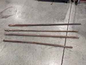 lot 878 image: Lot of (4) Solid Steel Pry Bars - Longest is 63 - NO SHIPPING