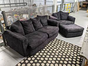 lot 921 image: Ashley Furniture Lot - Black Microfiber Couch, Chair, and Ottoman - NO SHIPPING