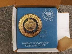 lot 20 image: Cadillac medallion