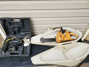 lot 22 image: Craftsman drill and Montgomery Ward chainsaw