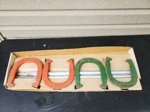 lot 25 image: Old horseshoe game set