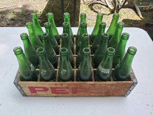 lot 122 image: Vintage Pepsi-Cola Crate with 20 Mt. Dew Bottles