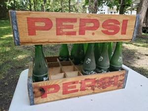 lot 124 image: Two Vintage Pepsi-Cola crates with 14 Bottles