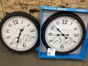 Lot of 2 AcuRite 24 in. Black Clock with Thermometer and Hygrometer one damaged edge