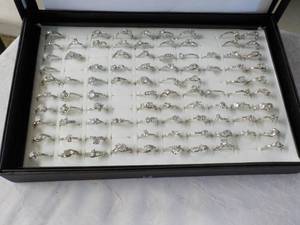 lot 65 image: 90 Zirconia Rings in a Display Case...