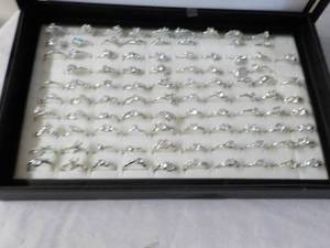 lot 67 image: 95 Zirconia Rings in a Display Case...