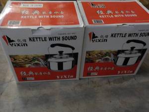 lot 224 image: 2 YIXIN Stainless Steel Kettles wit...