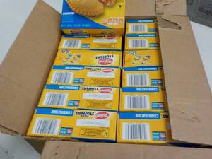 lot 328 image: Case of 12- 14 oz frozen  Totinos ...