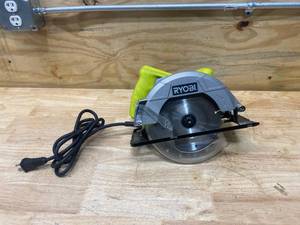 lot 67 image: RYOBI 13 Amp Corded 7-14 in. Circular Saw