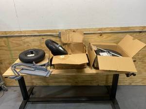 lot 102 image: Lot of Wheel Barrow Wheels and Parts