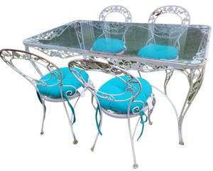 lot 02 image: Vintage Wrought Iron and Glass Patio Table and 4 Chairs-Table 80.5 x 32.5 x 28.75  Chairs 33 x 17 $1500 Value