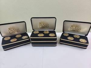 lot 59 image: 12 Vintage 1990s 24-Karat Gold-Plated Grand Casino Coins