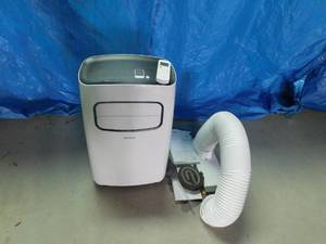 lot 13 image: Pelonis 12000 BTU portable air conditioner with remote