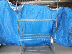 lot 15 image: Metal racking shelves on wheels