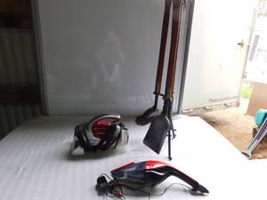 lot 33 image: 2 hand held vaccums & fireplace tools and stand