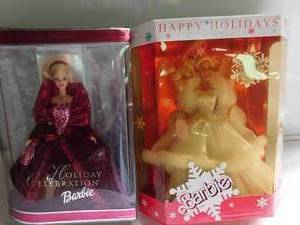 lot 37 image: 1989 Happy Holiday barbie & 2002 Holiday celebration barbie