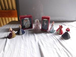 lot 57 image: 7 Hallmark Barbie Ornaments & I Hallmark Joyful messenger Ornament