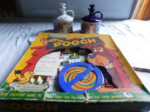 lot 59 image: 2 Jim Beam Limited Edition Bottle #750 & #900 & 1956 Pooch Game