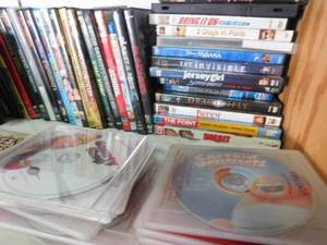 lot 97 image: Box of DVDs & Johnny Cash tin with 2 discs of music