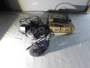 lot 115 image: Super Nintendo with 2 contollers & Mario World game