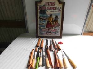 lot 151 image: 10 fishing filet knives, 7 filet knife cases, sharpener & a 3D fishing sign