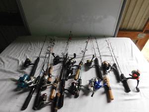 lot 158 image: 14 Ice fishing rods W reels and Hawg Frawg lures