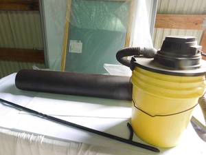 lot 178 image: New window, roofing paper, shop vac, fire pit poker
