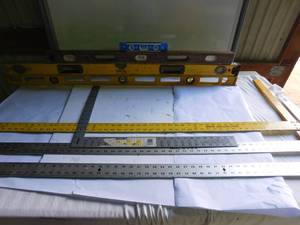 lot 191 image: 4 Levels, square, 2 T- squares.  Metal yd stick