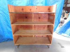 lot 194 image: Wooden 4 tier shelf on wheels