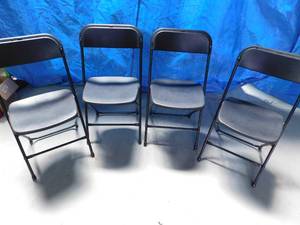 lot 215 image: 29 metal and plastic fold up chairs