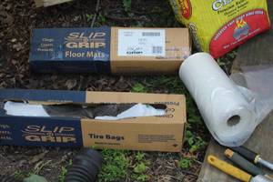 lot 49 image: Tire Bags, Slip-n-Grip Floor Mats